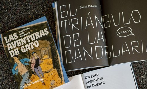 Portada de las aventuras de gato y una pagina en negro con letras blancas